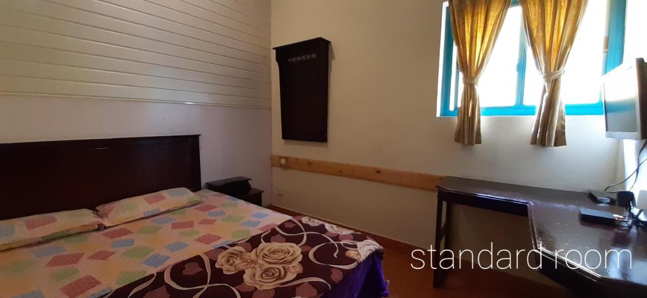 Greenview Holiday Inn Мунар Екстериор снимка