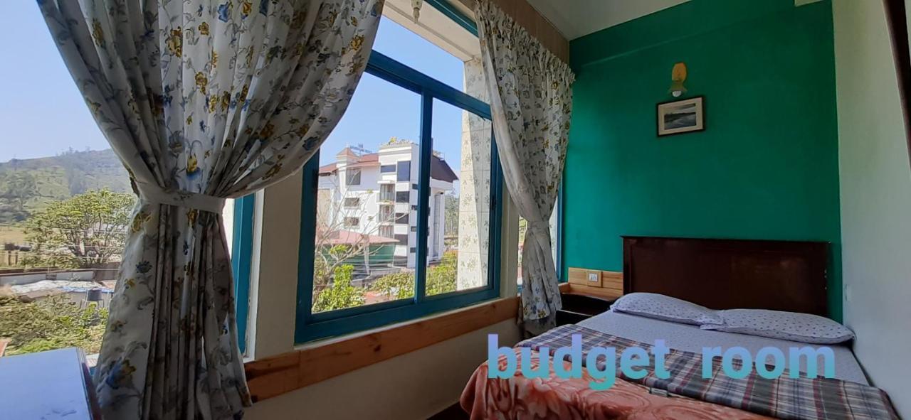 Greenview Holiday Inn Мунар Екстериор снимка
