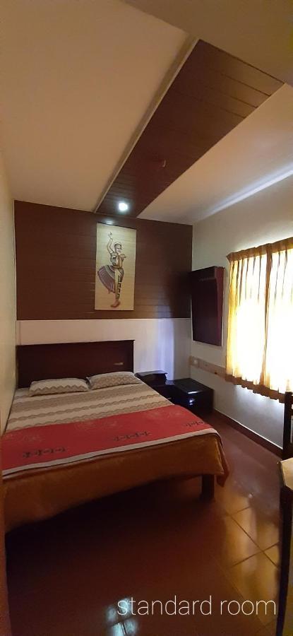Greenview Holiday Inn Мунар Екстериор снимка