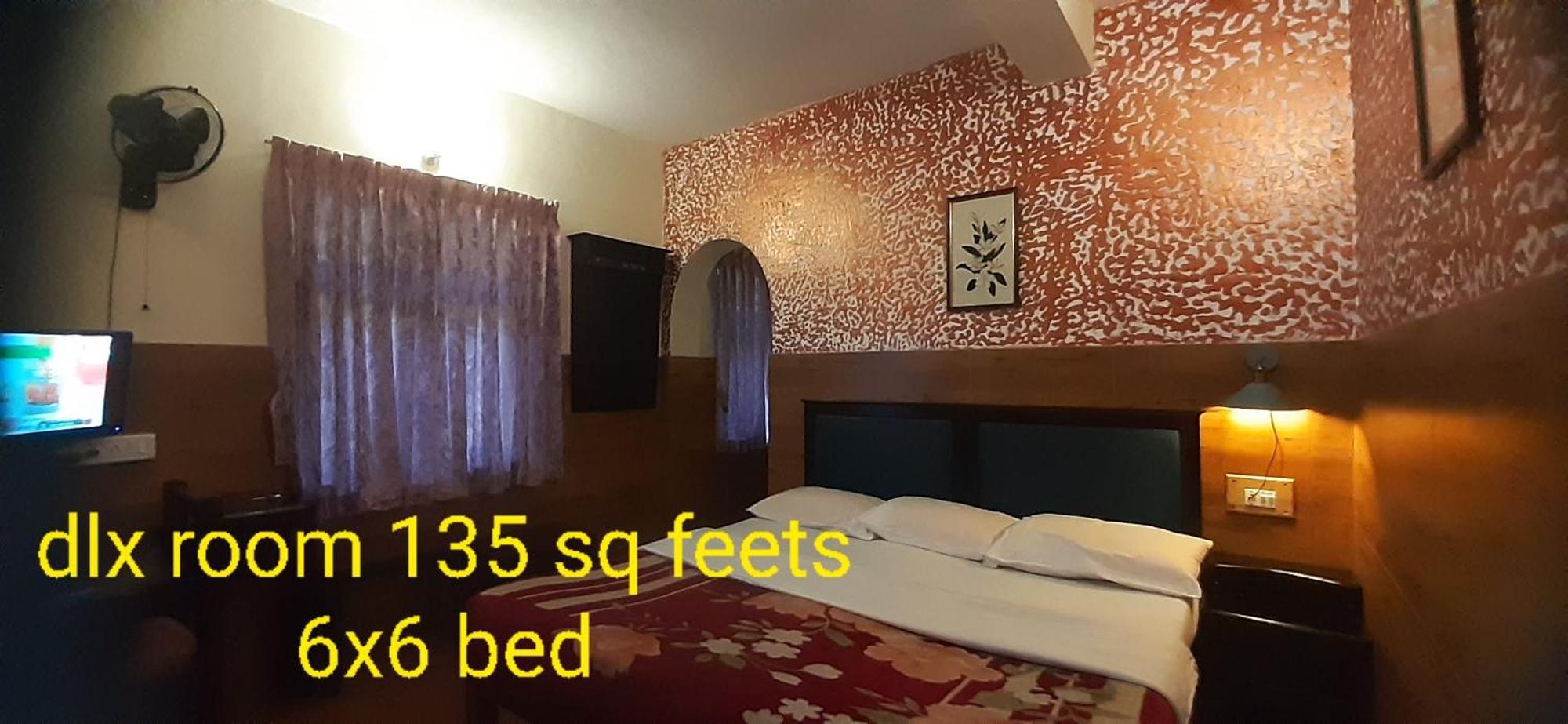 Greenview Holiday Inn Мунар Екстериор снимка
